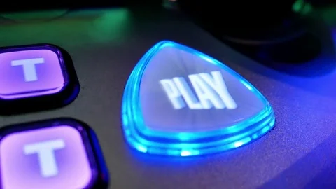 Close up spinning play button on slot machine inside Casino Video stock 85367471