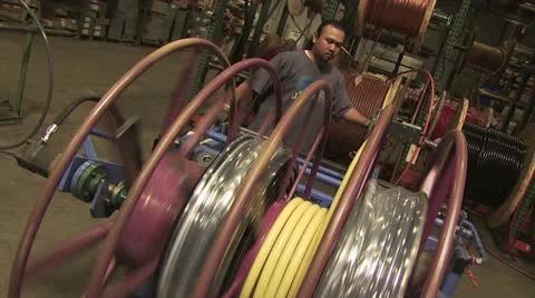 Close Up of Spinning Spools With Industrial Wire 스톡 동영상 18963586