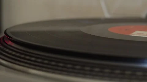 Close-up of spinning vinyl record on turntable Video stock 338178102