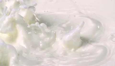 A close-up of a splash of milk Stock Photos