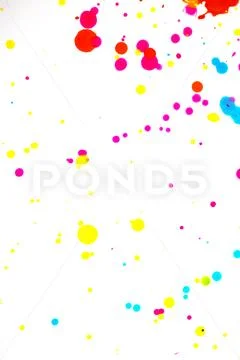 Close Up of Splattered Paint Blobs on White Paper for Abstract Background Stock Photos