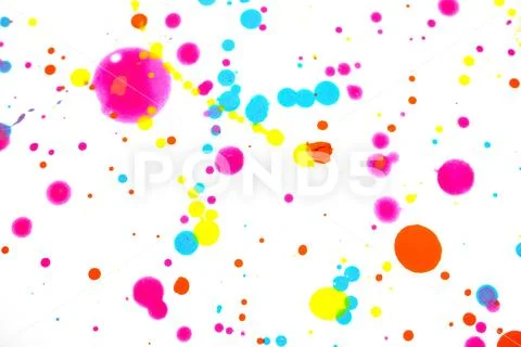 Close Up of Splattered Paint Blobs on White Paper for Abstract Background Stock Photos