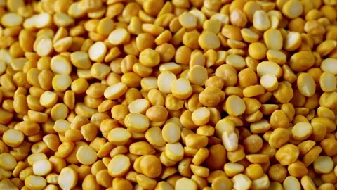 Close up split bengal gram or chana dal food texture footage rotate Stock Footage 262306293