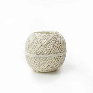 Close up of a spool of white cooking string. isolated white background Stock Photos