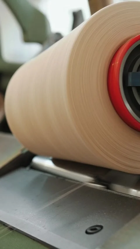 Close-up spools of yarn thread. Textile factory. Spinning production. Threads Stock Footage 316262627