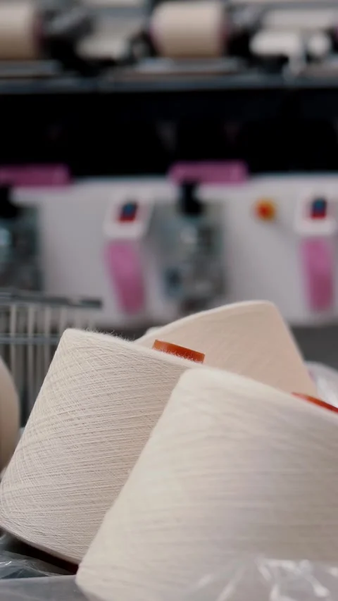 Close-up spools of yarn thread. Textile factory equipment. Threads production. Stock-Footage 321235084