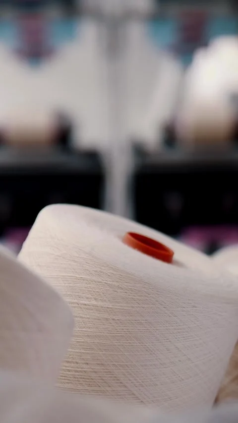 Close-up spools of yarn thread. Yarn making processes. Threads production. Stock Footage 315943322