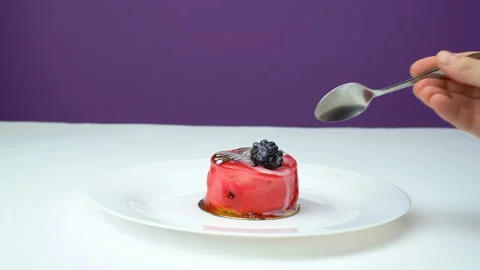 Close up spoon and fruit cupcake with white whipped cream and slices of fresh Stock Footage 126933928