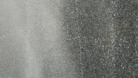 Close up Spray and Water drops spraying from a fountain in the air. Stock Footage 114690867