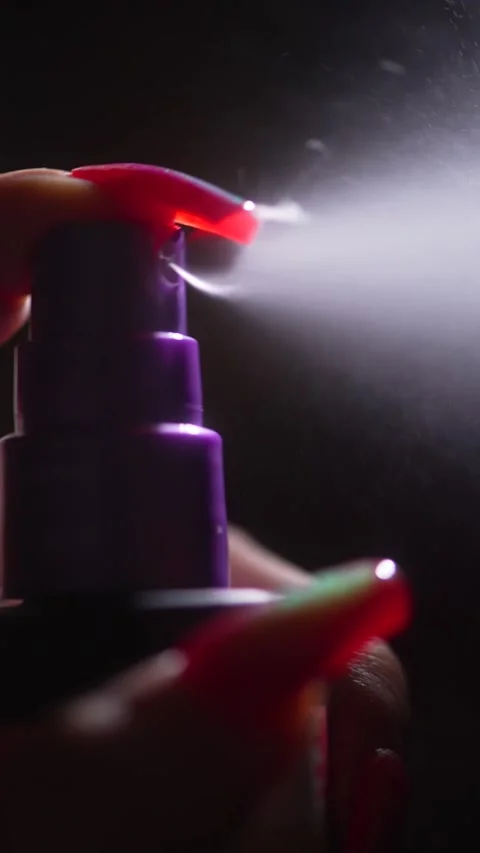 Close up of a spray bottle drops Stock Footage 171556931