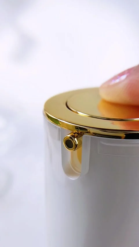 Close up of spray pump being pressed to dispense clear liquid mist. Elegant.. Stock Footage 338080687