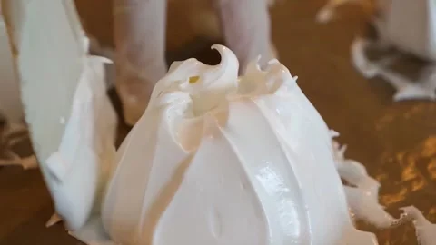 Close-up of Spreading Thick White Meringue with a Spatula Stock Footage 331780961