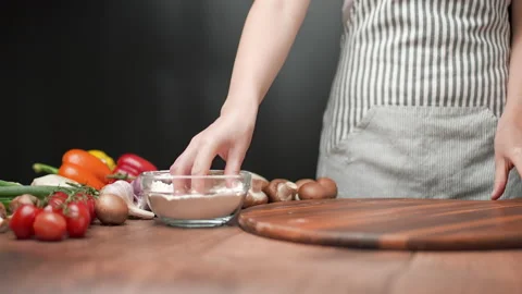 Close-up sprinkling in slow-motion with flour in 4K. Stock Footage 137483442