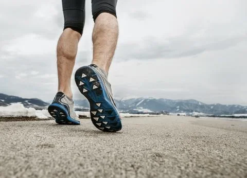 Close up sprinter legs on asphalt Foto stock
