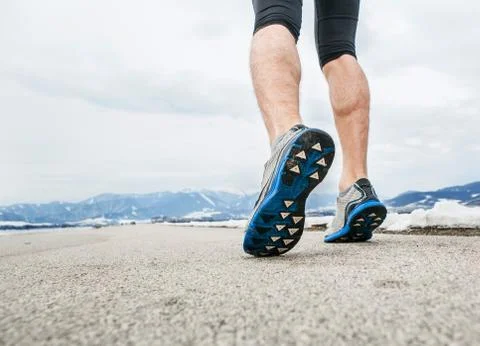Close up sprinter legs on asphalt Foto stock