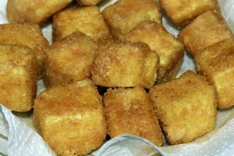 Close up of Square Cooked Crispy Fried Battered Tofu Soy Stock Photos