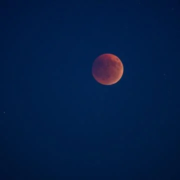 A close-up, square-format shot of the Blood Moon during a total lunar eclipse Stock Photos
