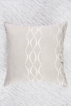 Close Up of Square Gray Throw Pillow Flat on Marble Stock Photos