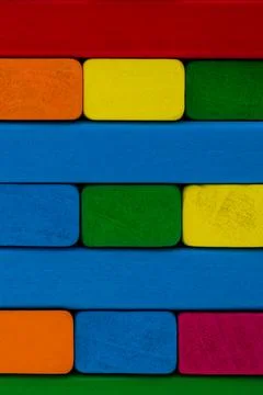 Close up square shape colorful background. Wooden color toy blocks background Stock Photos
