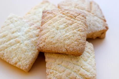 Close-up square shortbread cookie. Sugar coated homemade cookie. Stock Photos