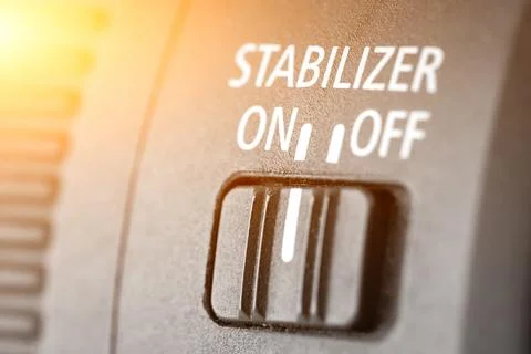 Close-up of the stabilization of the switch button in a modern lens, macro .. Foto stock