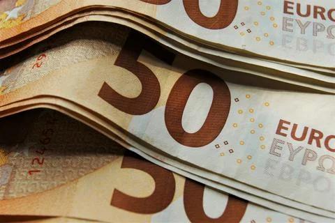 Close-up of a stack of 50 euro banknotes. Business and finance. Stock Photos