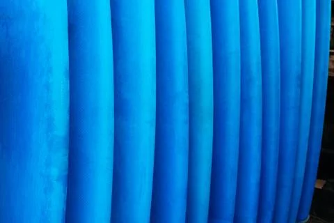 Close up stack of blue color soft surfboards in a stack by ocean.Bali.Indonesia Stockfoto's