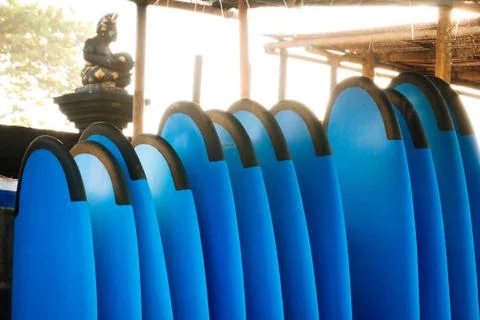 Close up stack of blue color soft surfboards in a stack by ocean.Bali.Indones Stockfoto's
