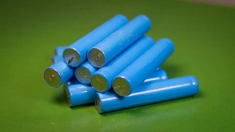 Close-up of a stack of blue lithium-ion batteries Stock Photos