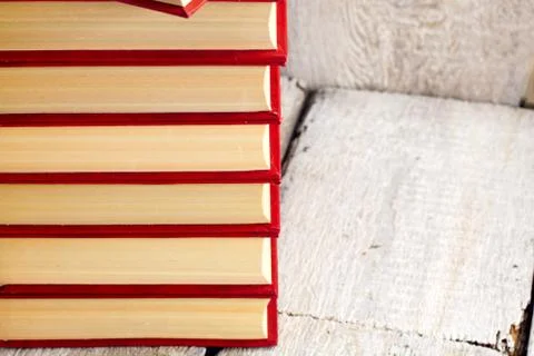 Close up on stack of book on white rustic background Stock Photos