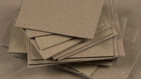 Close-up of stack of brown cardboard pieces Stock Footage 323694469