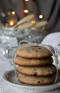 Close up of stack of chip cookie with Christmas decoration background. Stock Photos