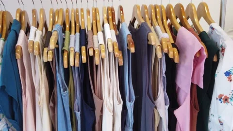 Close up of stack of clothes hanging Stock Footage 201370503