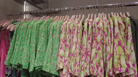 Close up of stack of clothes hanging Stock Footage 235281683