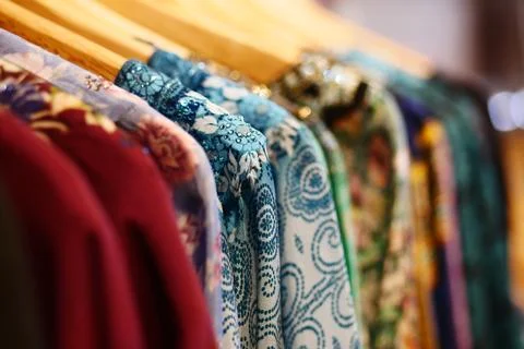 Close up of stack of clothes hanging 스톡 사진
