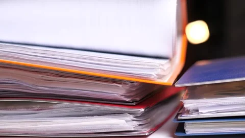 Close-up of a stack of colored folders with documents Stock Footage 271073941