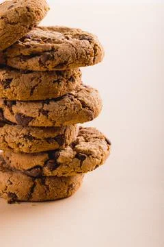 Close-up of stack of cookies on beige background with copy space Foto stock