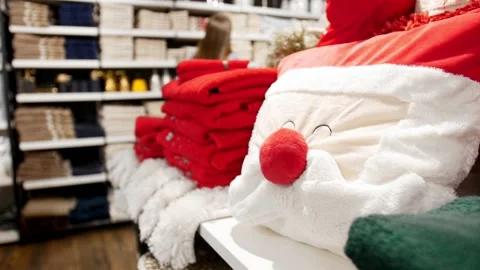 Close-up of stack of cotton terry christmas towels and pillows in the mall. Stock Footage 145293785