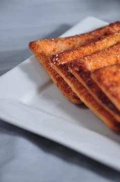 Close up of stack of cracker on the white plate Foto stock