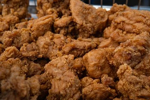 Close-up of a stack of deep-fried boneless chicken pieces Stock Photos