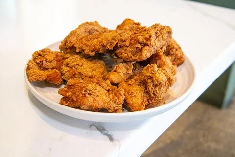 Close-up of a stack of deep-fried boneless chicken pieces Stock Photos