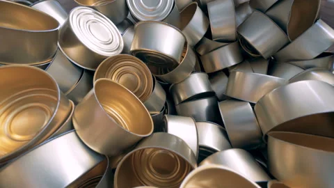 Close up of a stack of empty tin cans laying in a wooden box Stock Footage 86376601