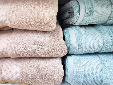 Close up of stack of fluffy fiber bath towels. Hygiene and hand care disinf.. Stock Photos