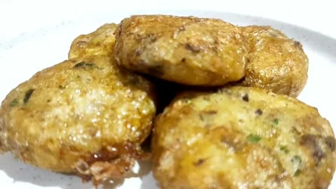 Close Up of Stack Fried Perkedel Kentang Dish on White Plate Stock Footage 321724700
