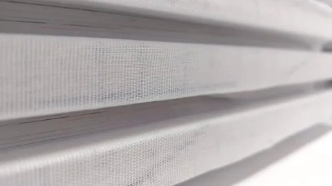 Close-up of a stack of glued book blocks prepared for binding in a printing hous Stock Footage 311166492