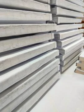 Close-up, a stack of glued book blocks prepared for binding in a printing h.. Stock Photos