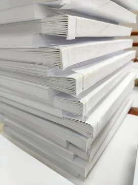 Close-up, a stack of glued book blocks prepared for binding in a printing h.. Stock Photos