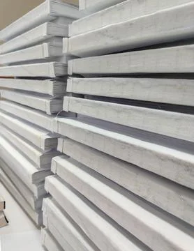 Close-up, a stack of glued book blocks prepared for binding in a printing h.. 写真素材