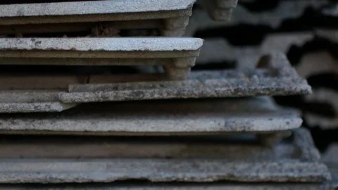 Close-up of a stack of gray tiles Stock Footage 89917648