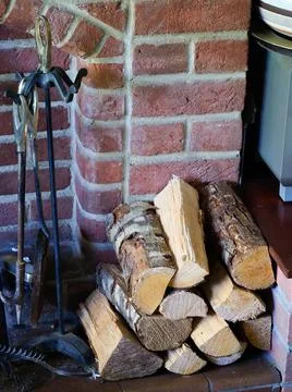 Close-up of a stack of logs for a domestic fireplace Stock Photos